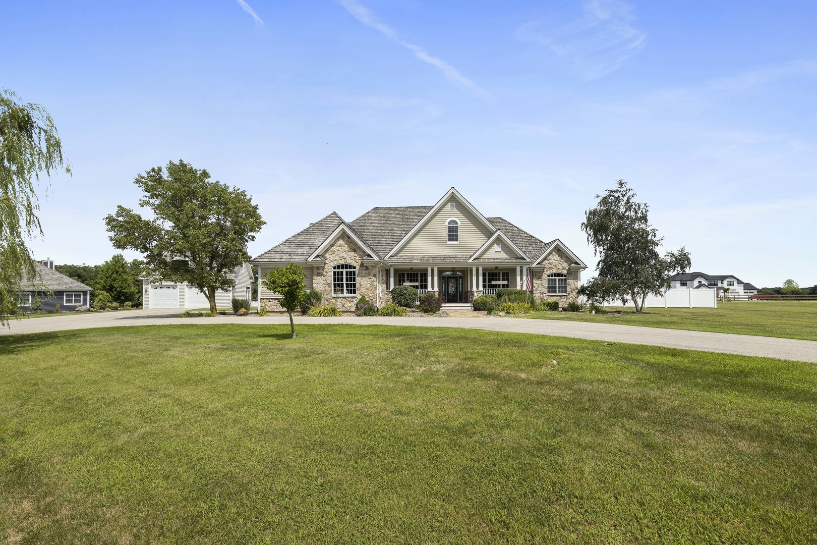 1130 Eagle Chase Drive Marseilles, IL 61360 - Photo 1 of 48 a front view of a house with a garden
