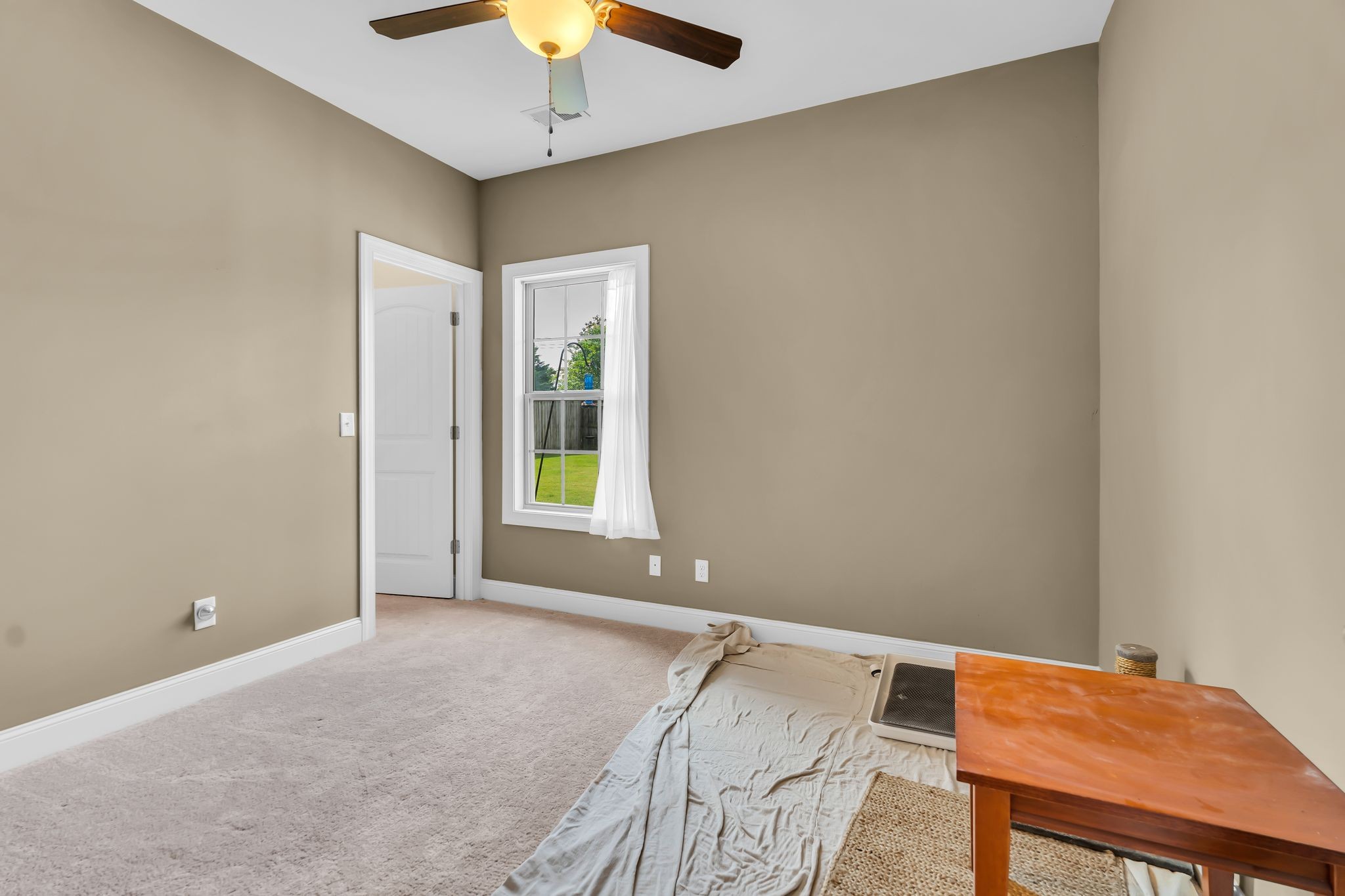 1103 Millstone Creek Road Lascassas, TN 37085 - Photo 19 of 38 a view of workspace room with window and chandelier fan