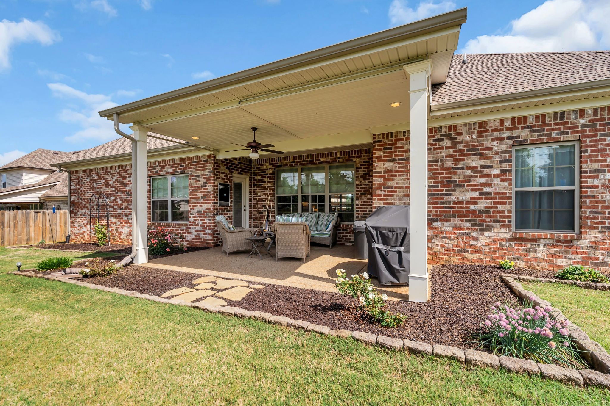 1103 Millstone Creek Road Lascassas, TN 37085 - Photo 25 of 38 a view of a house with backyard sitting area and porch