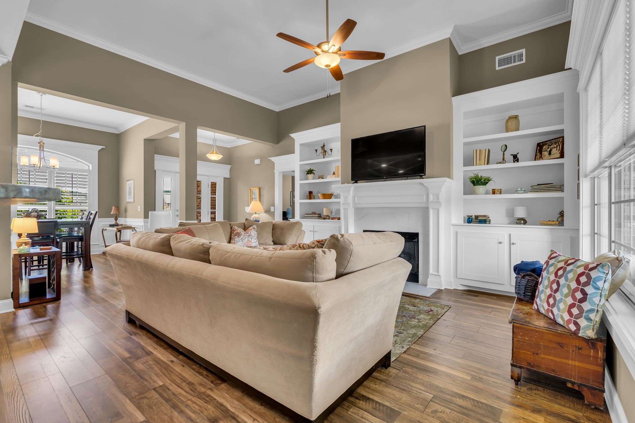 1103 Millstone Creek Road Lascassas, TN 37085 - Photo 6 of 38 a living room with furniture a flat screen tv and a fireplace