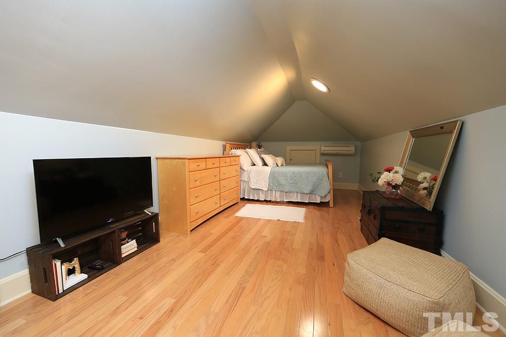 1530 Carson Street Raleigh, NC 27608 - Photo 14 of 21 The second floor has hardwood floors and a screened porch! Perfect flex space for office/guest/hobby room.