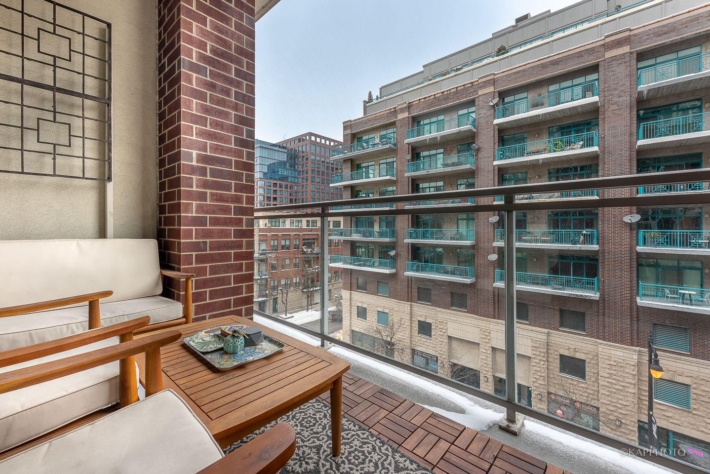 901 West Madison Street, Unit 512 Chicago, IL 60607 - Photo 12 of 36 a view of a building from a balcony