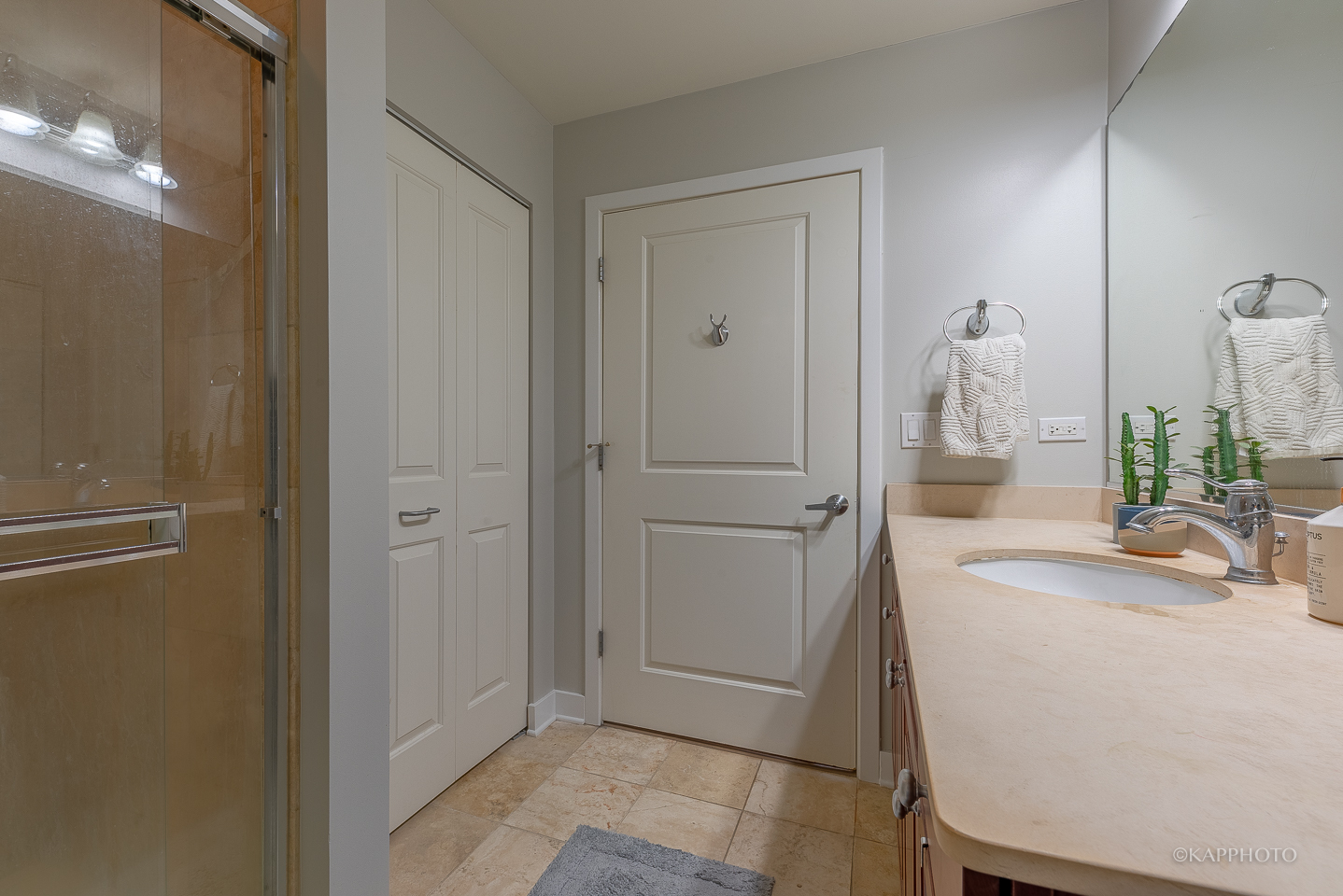 901 West Madison Street, Unit 512 Chicago, IL 60607 - Photo 22 of 36 a bathroom with a sink and mirror