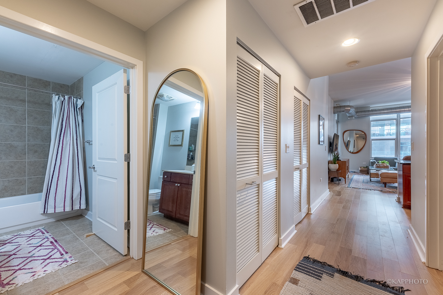 901 West Madison Street, Unit 512 Chicago, IL 60607 - Photo 28 of 36 a view of a hallway view with living room and a couch