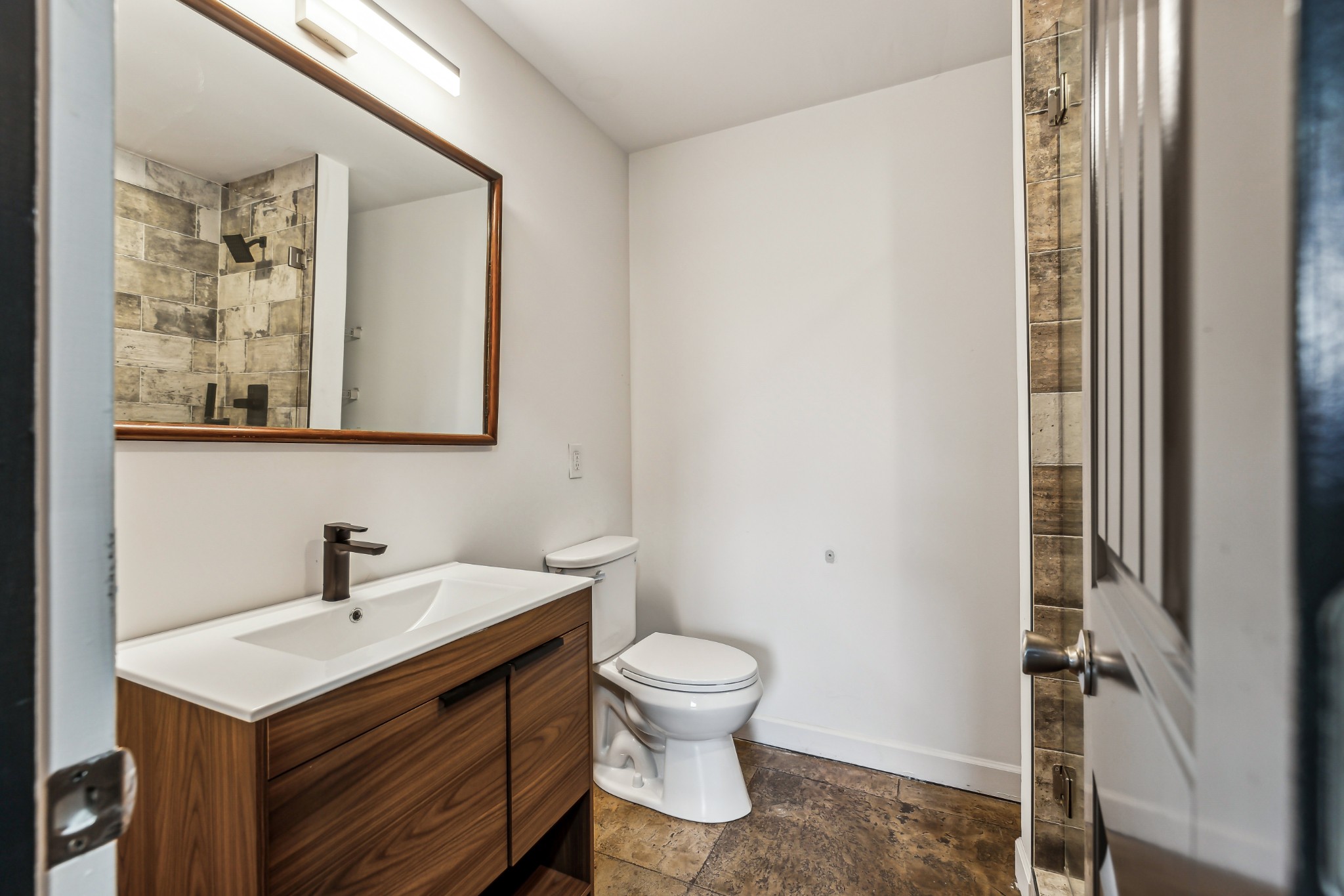 3772 Beasleys Bend Road Lebanon, TN 37087 - Photo 19 of 25 a bathroom with a toilet a sink and mirror