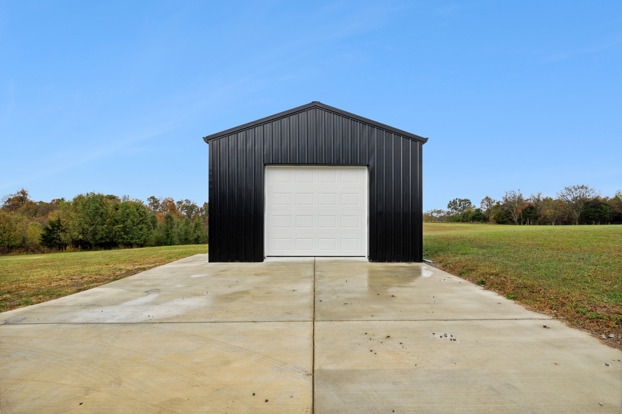 3772 Beasleys Bend Road Lebanon, TN 37087 - Photo 25 of 25 a front view of a house with a yard and garage