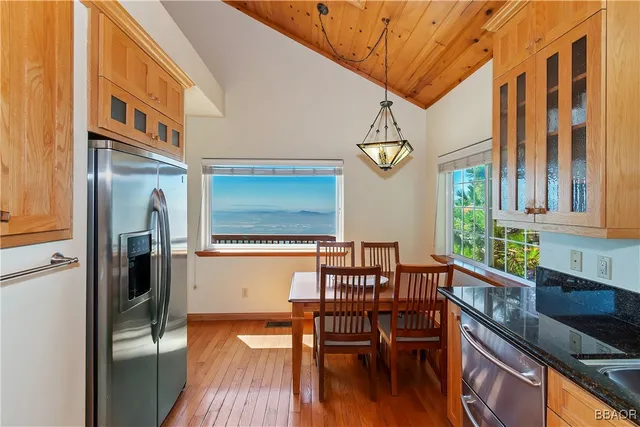 a view of a kitchen with furniture and a window