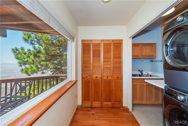 a view of a kitchen with a sink and dishwasher