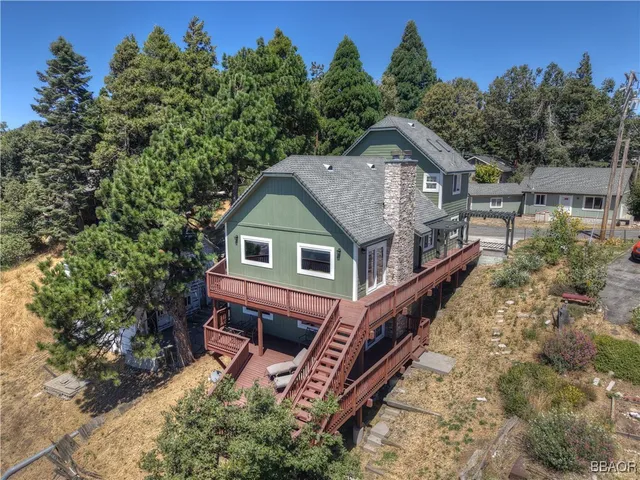 a house with trees in the background