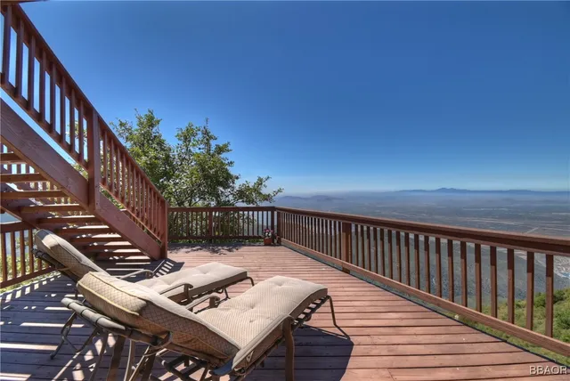 a view of balcony and wooden floor