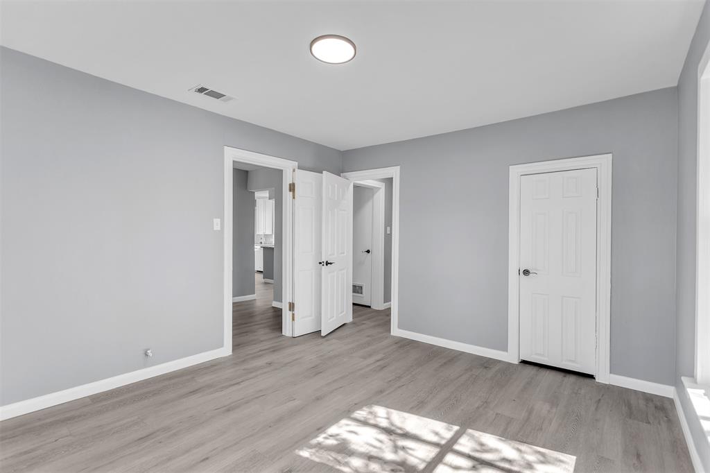 904 North Virginia Street Terrell, TX 75160 - Photo 20 of 22 a view of an empty room and wooden floor