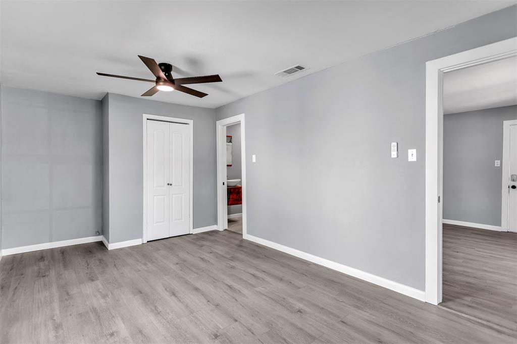 904 North Virginia Street Terrell, TX 75160 - Photo 9 of 22 a view of empty room with wooden floor