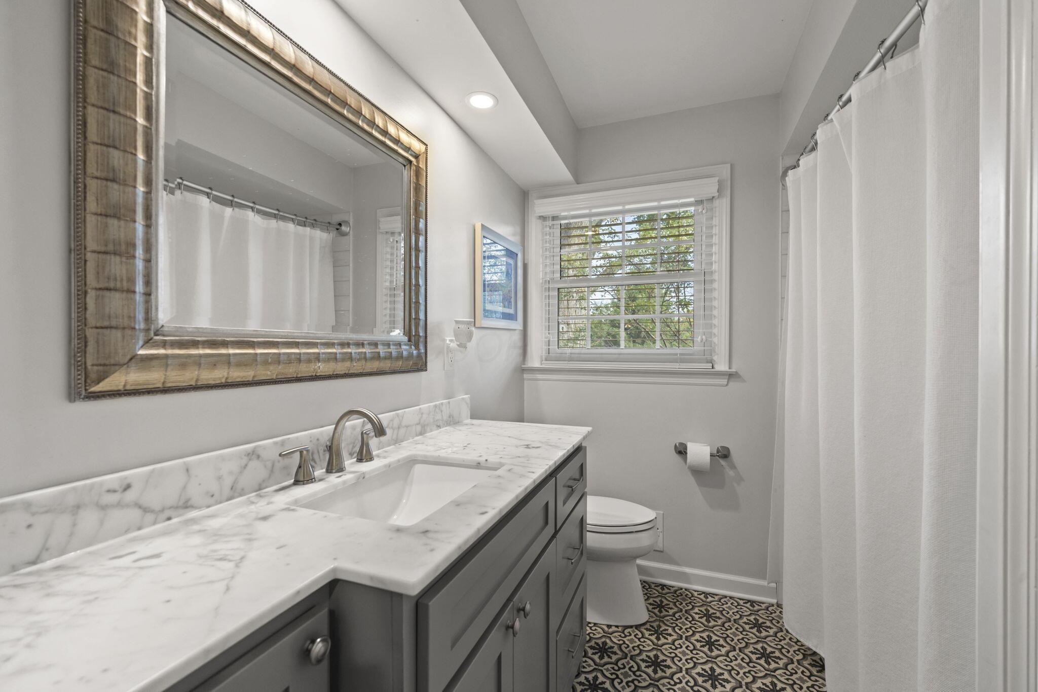1561 Kirkley Road Columbus, OH 43221 - Photo 30 of 92 The upstairs has an updated full bath for bedrooms 2 and 3 to share
