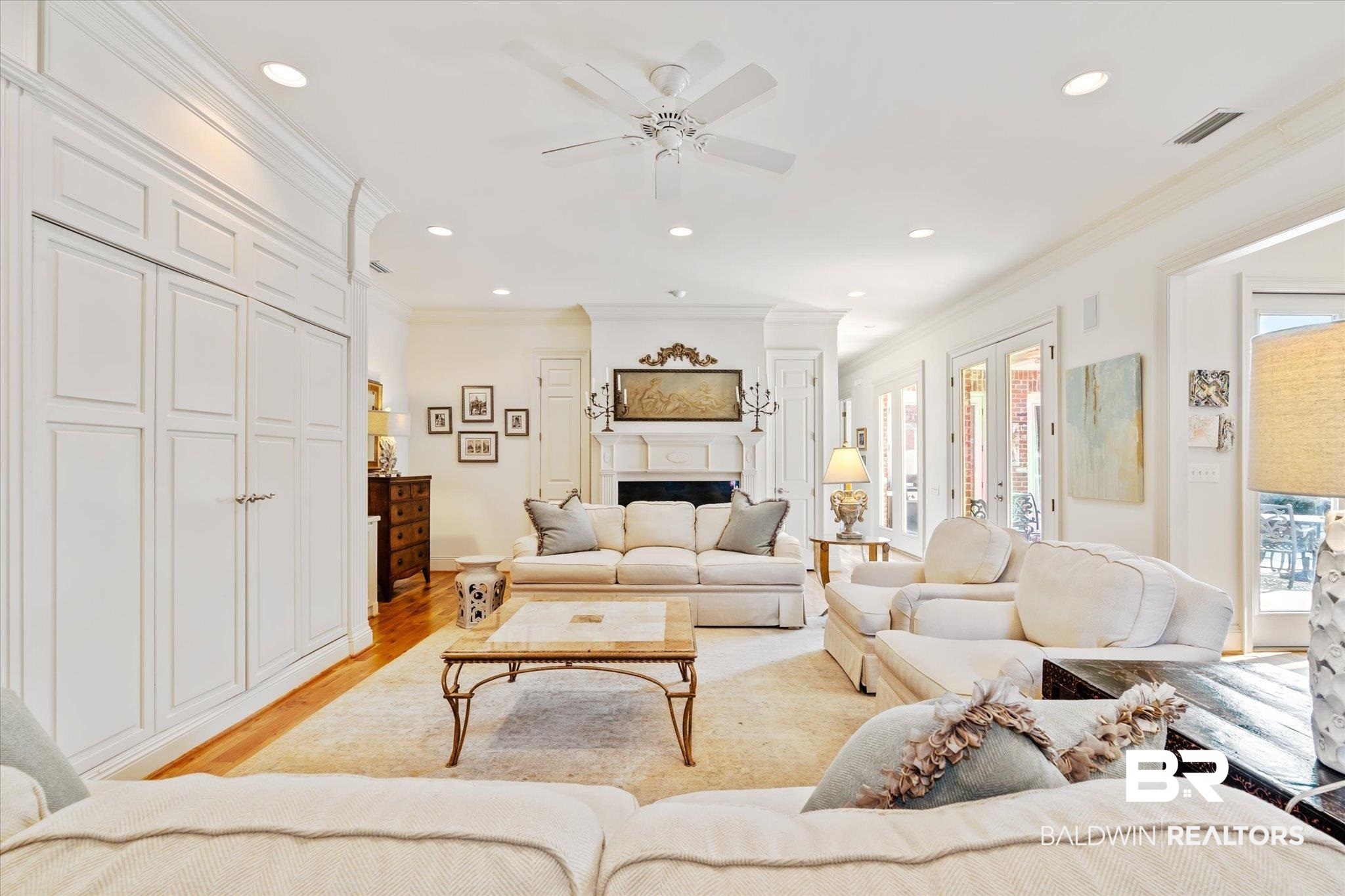 3963 Wimbledon Park Mobile, AL 36608 - Photo 16 of 51 Living room with ceiling fan, light wood-type flooring, and crown molding