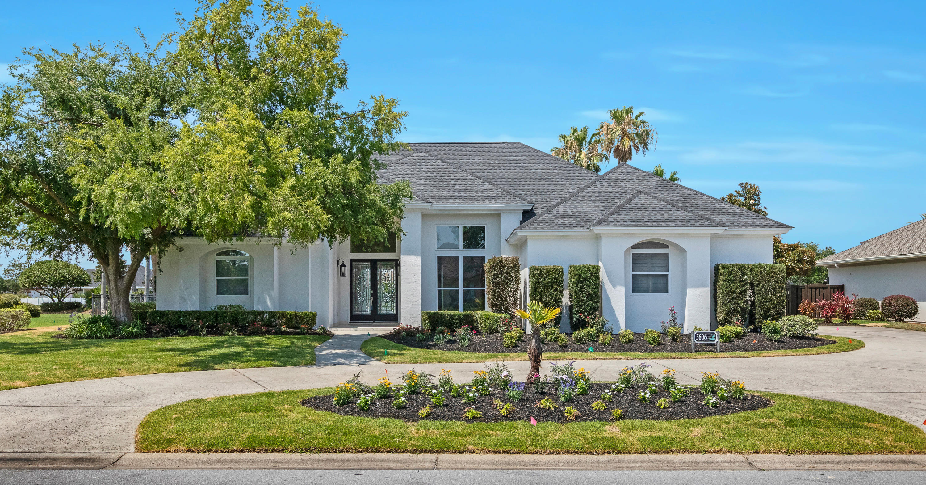 3606 Dragon's Ridge Road Panama City Beach, FL 32408 - Photo 1 of 49 front view of a house with a yard