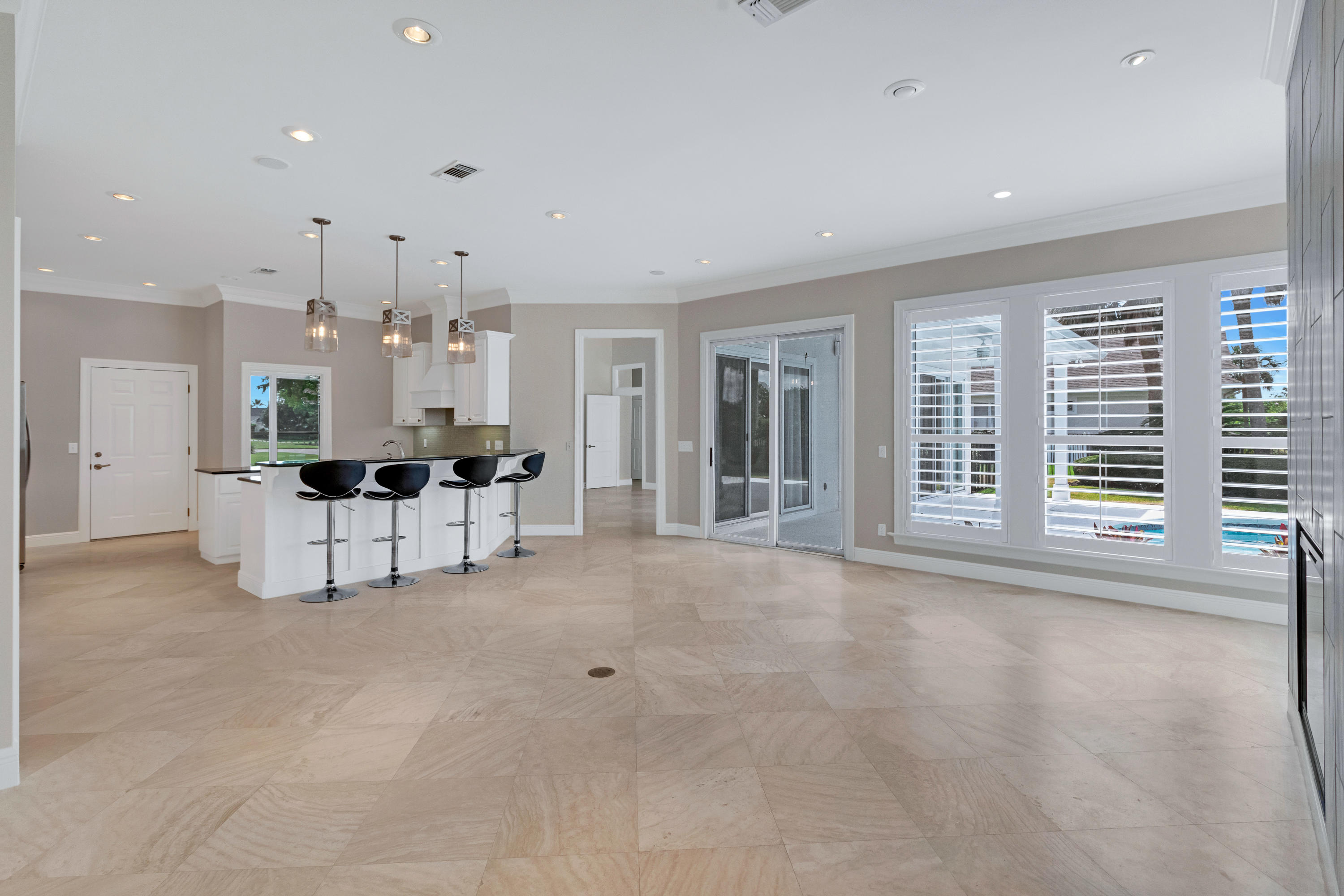 3606 Dragon's Ridge Road Panama City Beach, FL 32408 - Photo 16 of 49 a view of kitchen with windows and chandelier