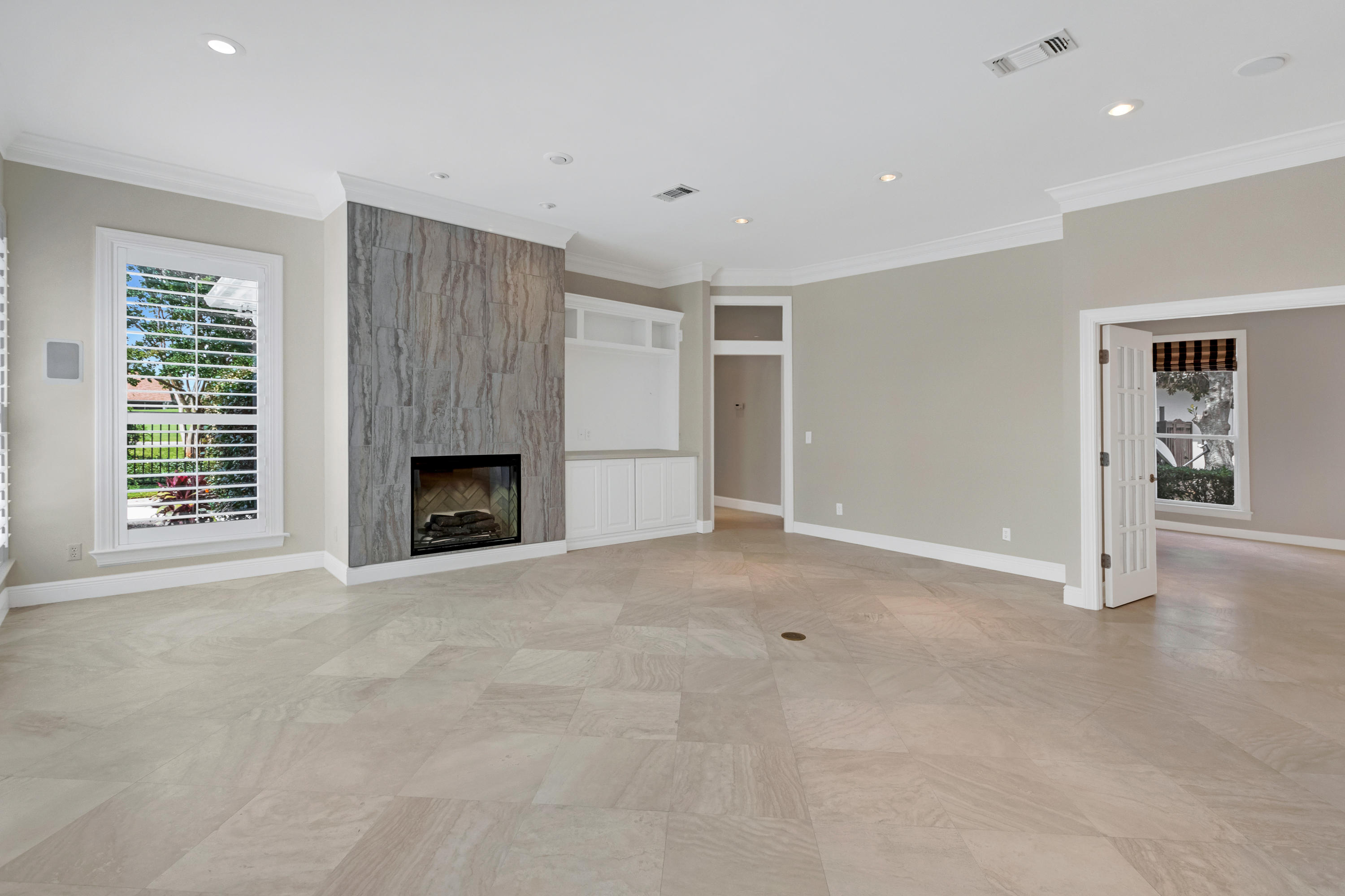 3606 Dragon's Ridge Road Panama City Beach, FL 32408 - Photo 18 of 49 a view of an empty room with a fireplace and a window