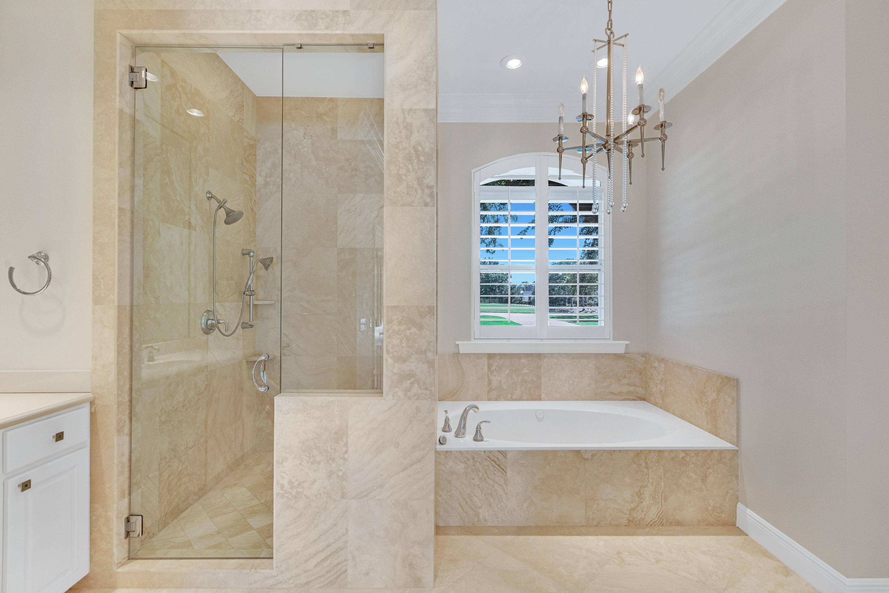 3606 Dragon's Ridge Road Panama City Beach, FL 32408 - Photo 23 of 49 a bathroom with a bathtub a shower a sink and a window