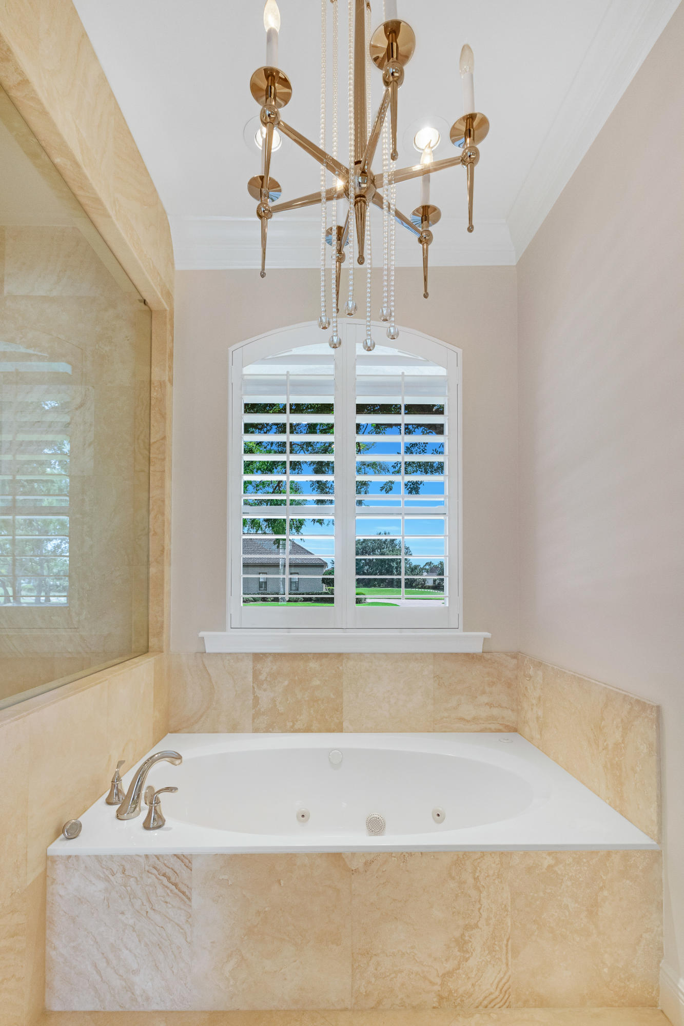 3606 Dragon's Ridge Road Panama City Beach, FL 32408 - Photo 26 of 49 a bathroom with a bathtub and window