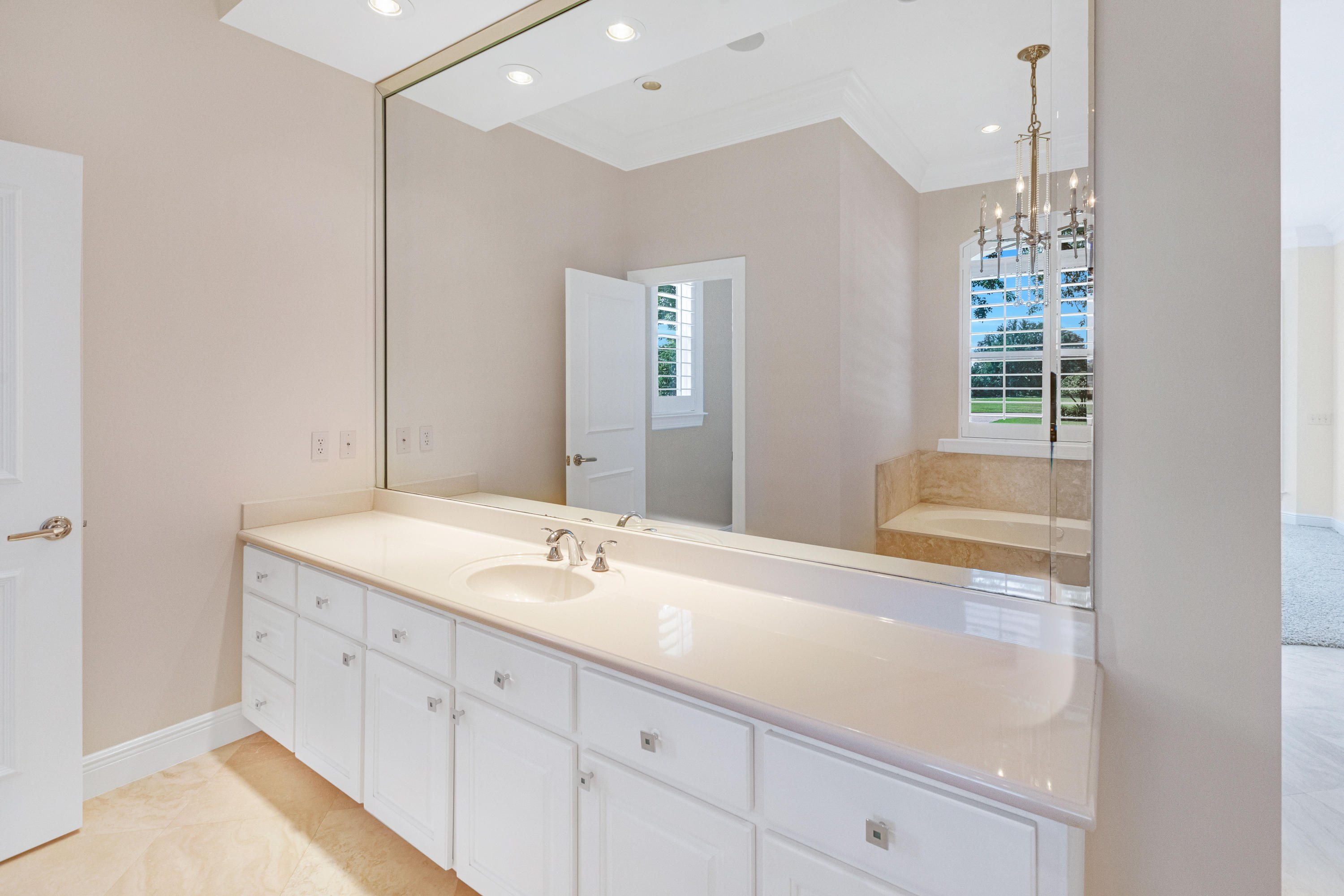 3606 Dragon's Ridge Road Panama City Beach, FL 32408 - Photo 28 of 49 a bathroom with a sink and a mirror