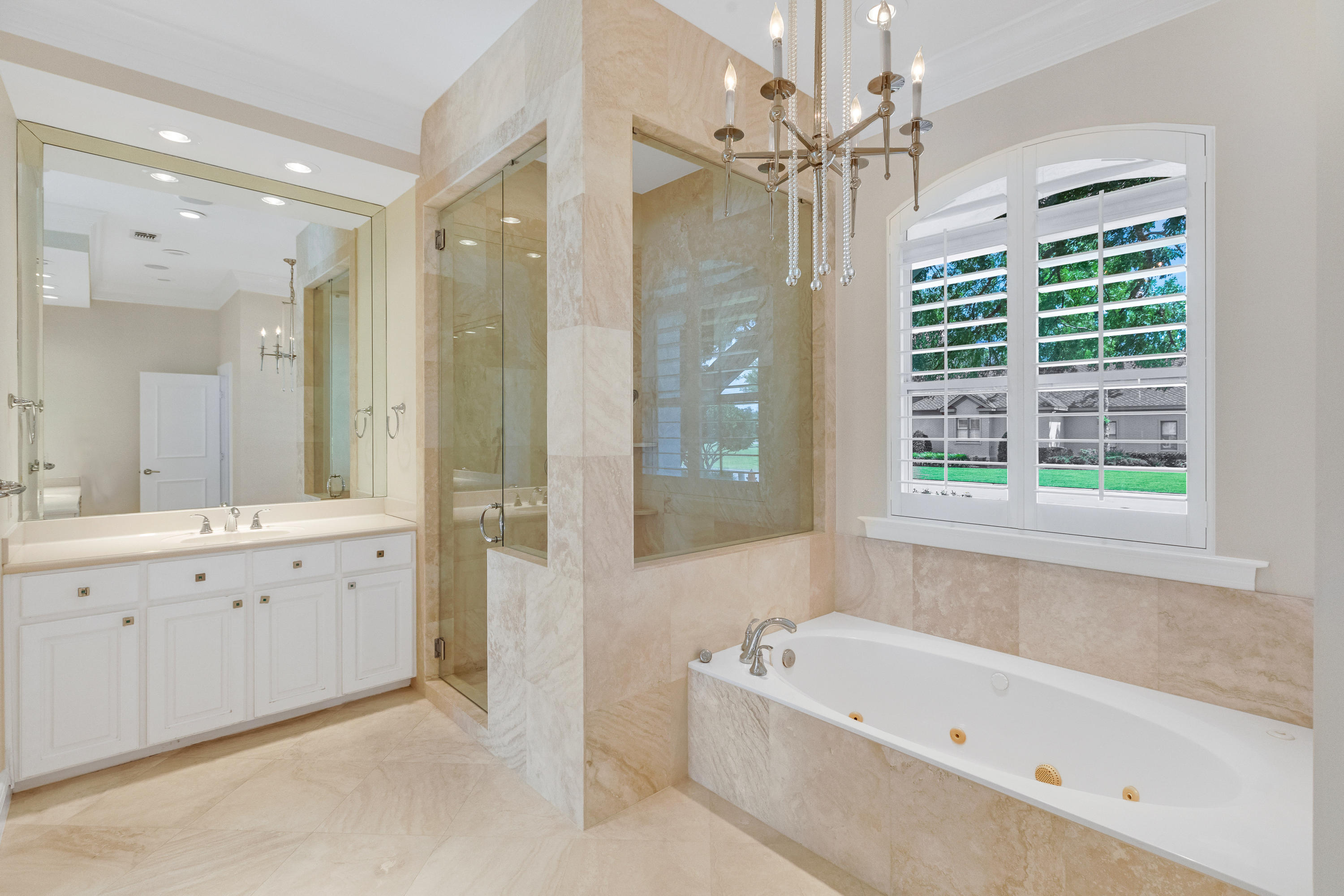 3606 Dragon's Ridge Road Panama City Beach, FL 32408 - Photo 29 of 49 a bathroom with a tub a sink double vanity and a shower