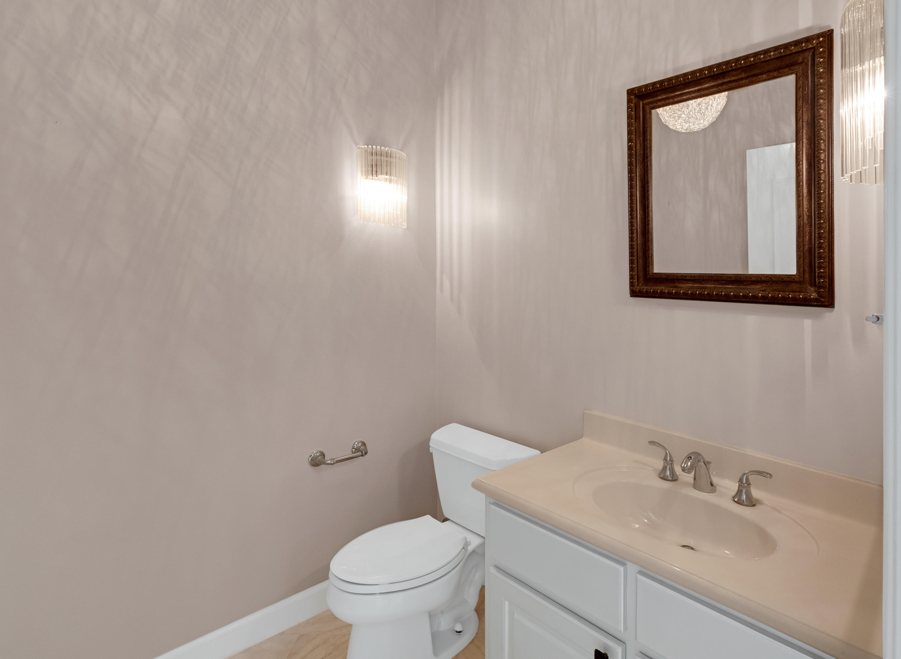 3606 Dragon's Ridge Road Panama City Beach, FL 32408 - Photo 39 of 49 a bathroom with a toilet sink and mirror