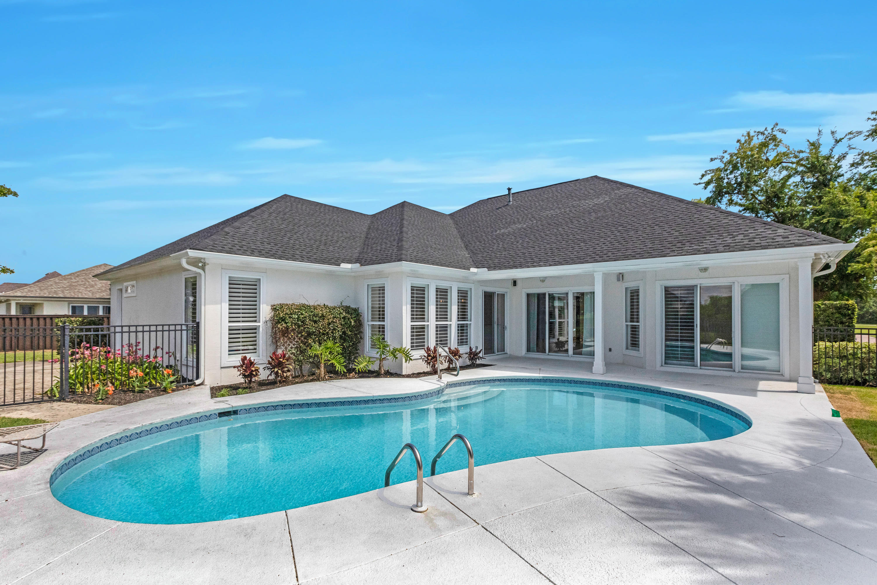 3606 Dragon's Ridge Road Panama City Beach, FL 32408 - Photo 42 of 49 a view of a house with a swimming pool