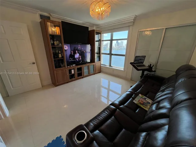 a room with gym equipment and a mirror