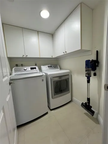 a kitchen with a stove and cabinets