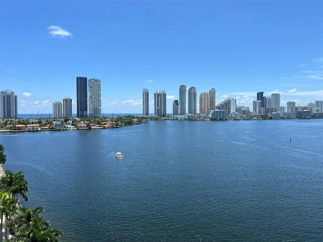 a view of a city with tall buildings