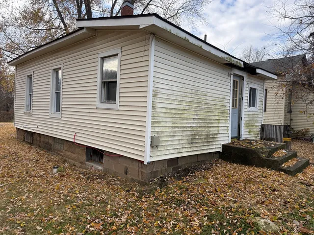 a front view of a house with a window