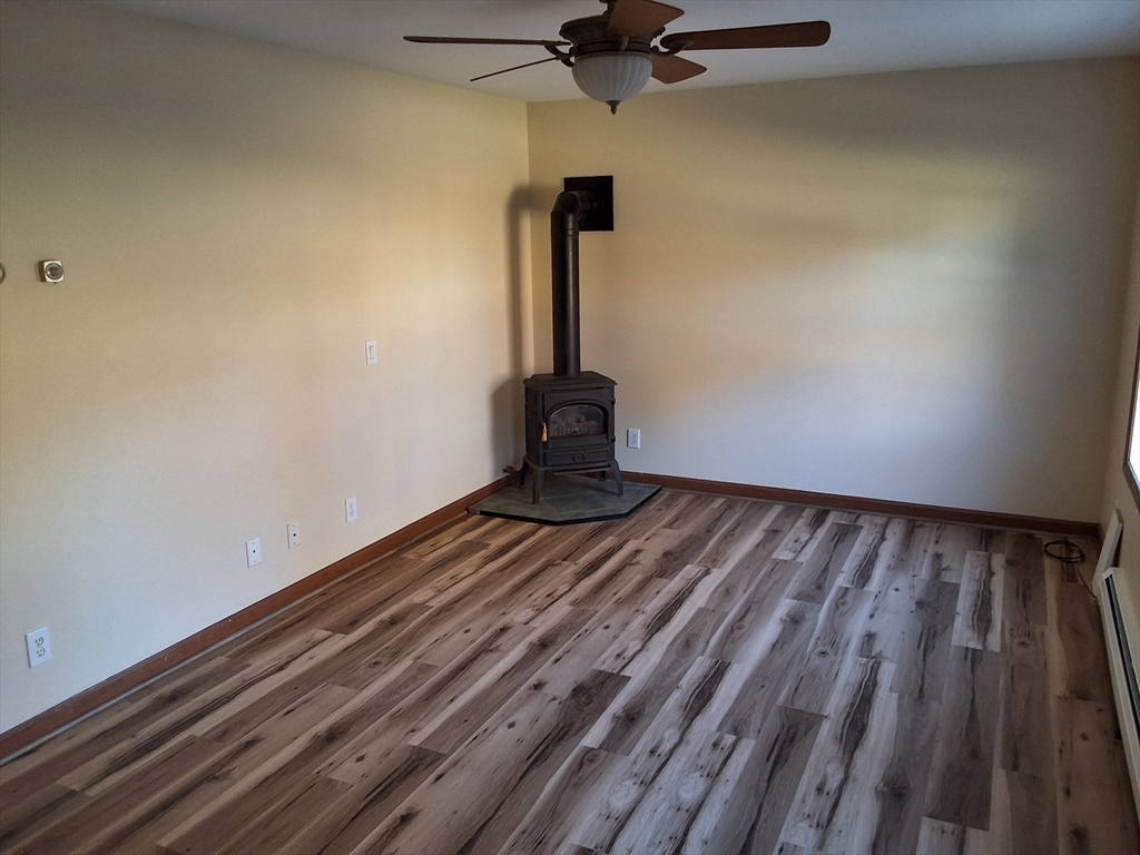 103 Barre Road Oakham, MA 01068 - Photo 13 of 26 a view of a room with wooden floor