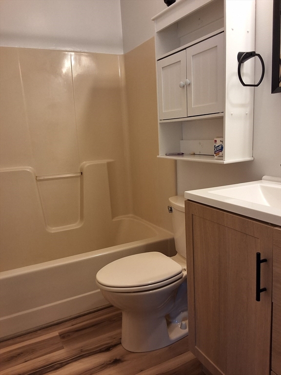 103 Barre Road Oakham, MA 01068 - Photo 18 of 26 a bathroom with a toilet a sink and mirror
