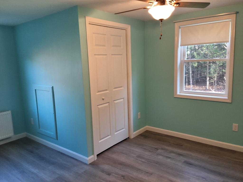 103 Barre Road Oakham, MA 01068 - Photo 25 of 26 an empty room with closet and a window