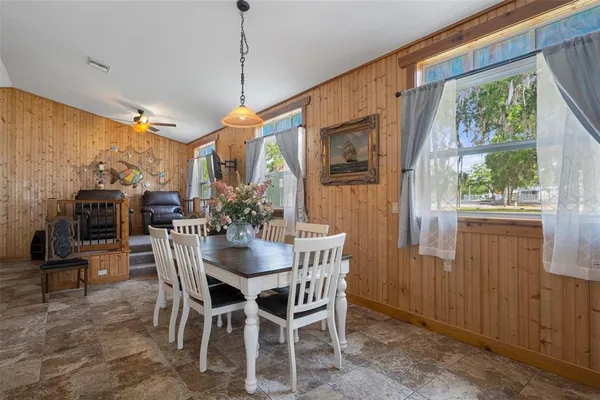 a view of a dining room with furniture