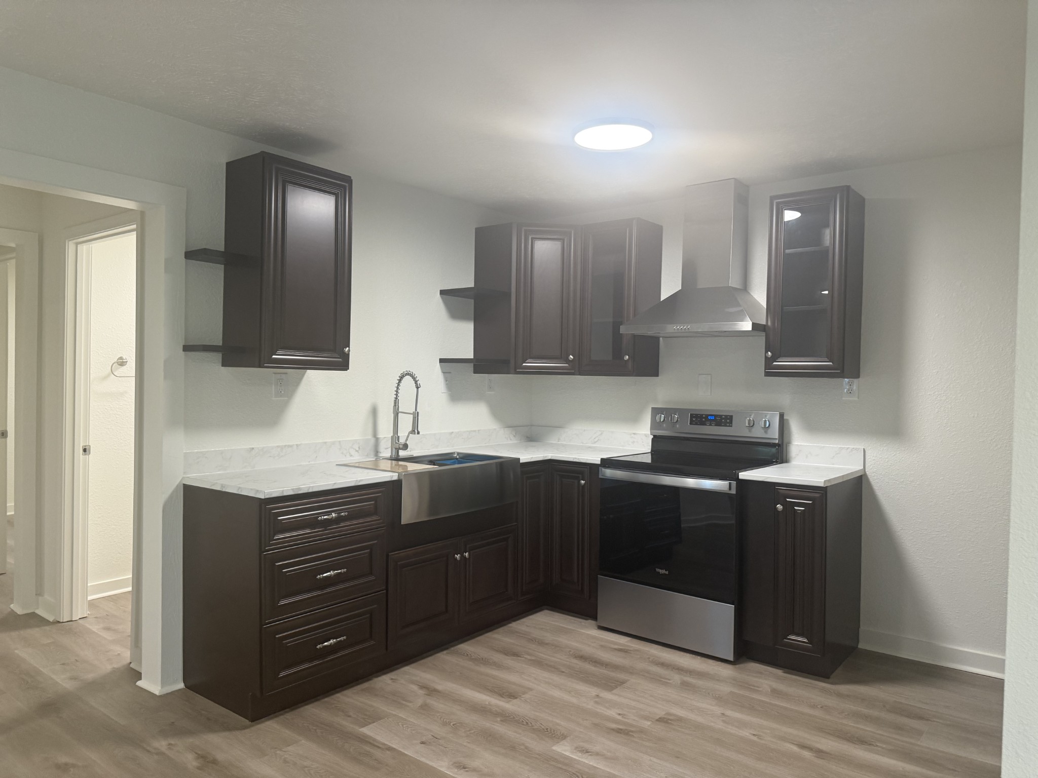 159 Hanklochte Drive Decaturville, TN 38329 - Photo 20 of 39 a kitchen with a sink and cabinets