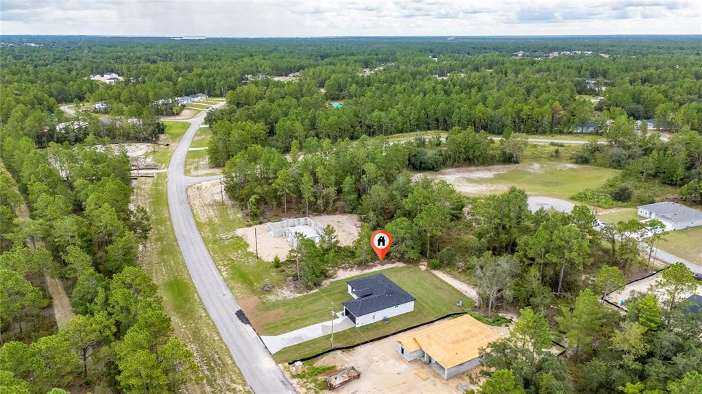 8922 Southwest 135th Street Road Ocala, FL 34473 - Photo 3 of 44 a view of a city