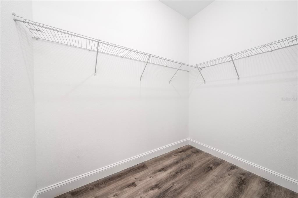 8922 Southwest 135th Street Road Ocala, FL 34473 - Photo 31 of 44 a view of a room with racks on the wall