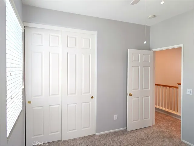 a view of a livingroom with wooden floor