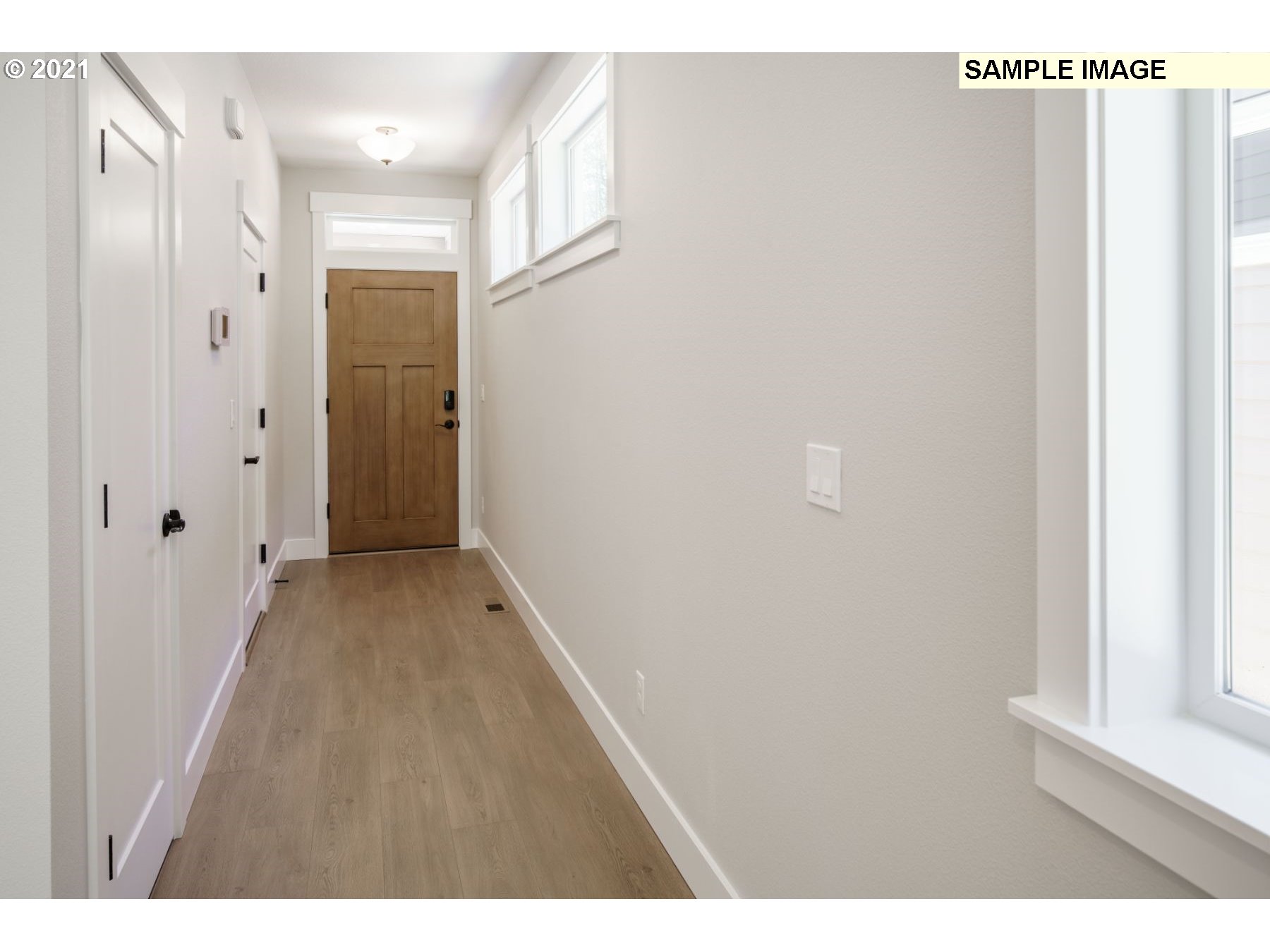 Northeast 109th Circle Vancouver, WA 98682 - Photo 3 of 9 a view of hallway with wooden floor