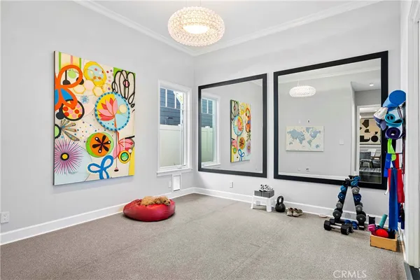 a room with toys and wall painting