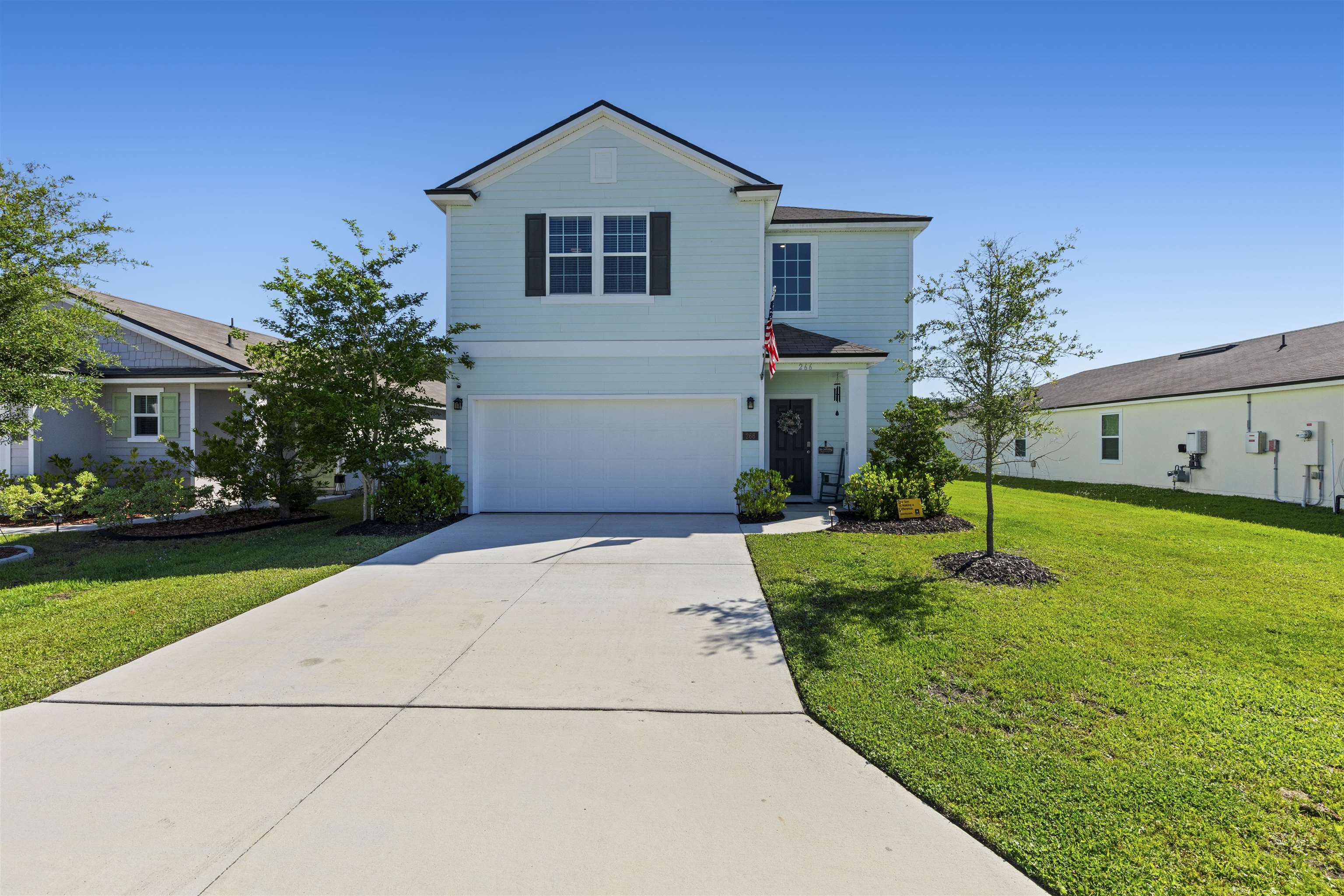 266 Caminha Road St. Augustine, FL 32084 - Photo 1 of 59 a front view of a house with a yard