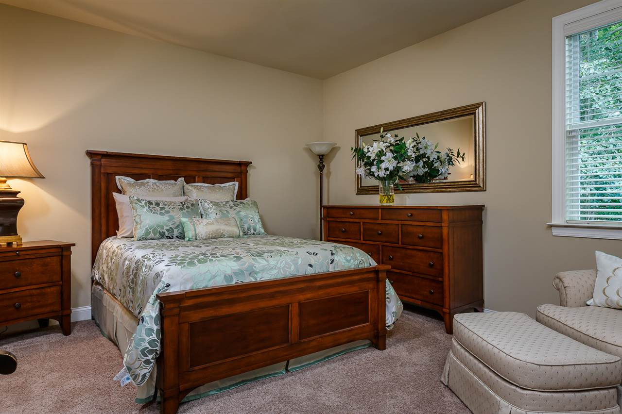 8103 Dreamy Way Raleigh, NC 27613 - Photo 18 of 25 Large windows in every room gives warm natural light. The bedrooms are large enough to host space for large bedroom suites. 2nd Floor 2nd Bedroom