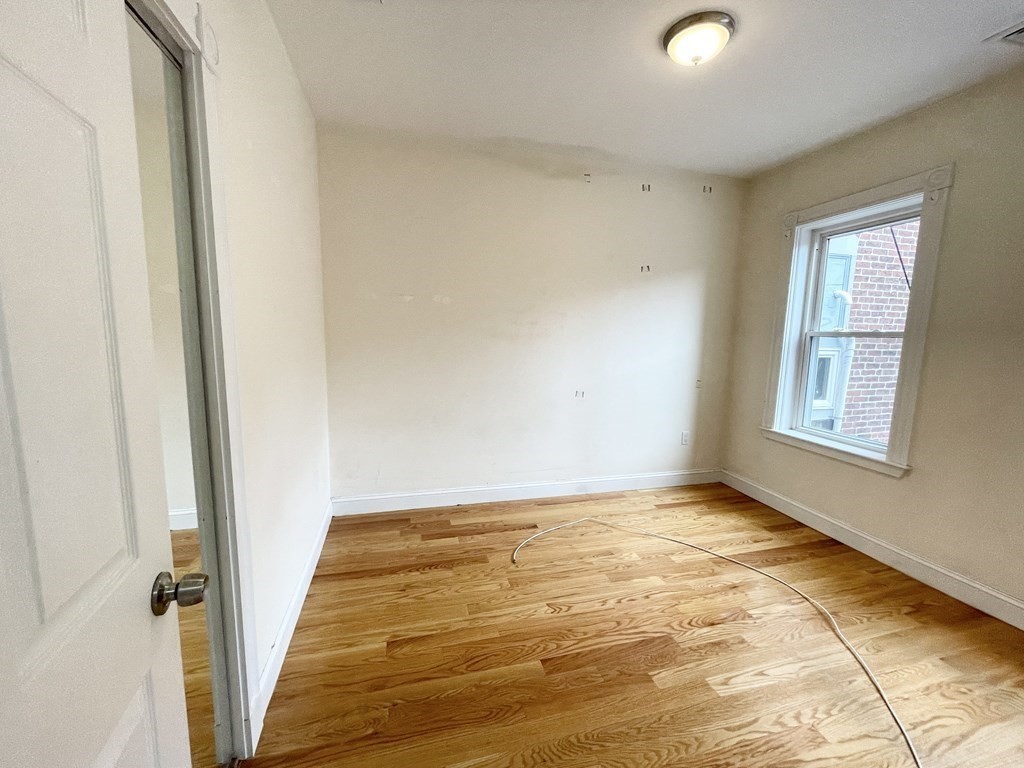 98 L Street, Unit STREET Boston, MA 02127 - Photo 9 of 19 a view of an empty room