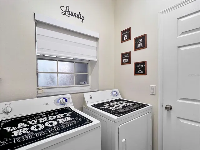 a kitchen with a stove and a refrigerator