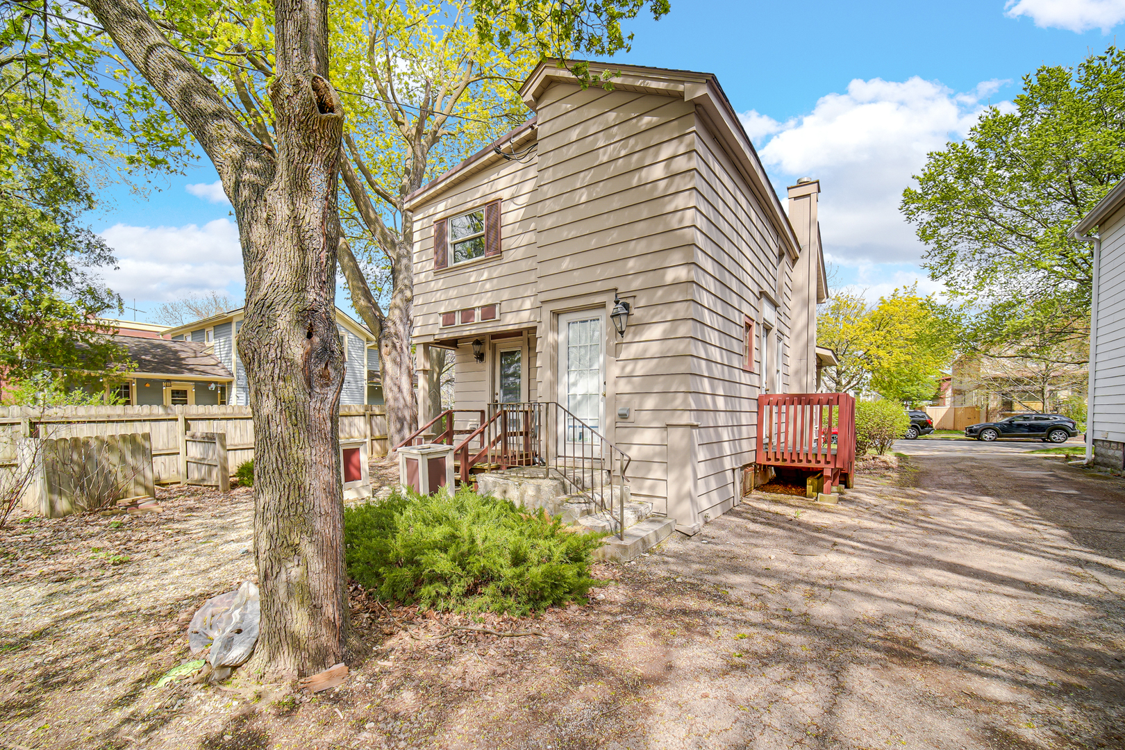 223 North Center Street Naperville, IL 60540 - Photo 16 of 19 a view of a house with a yard