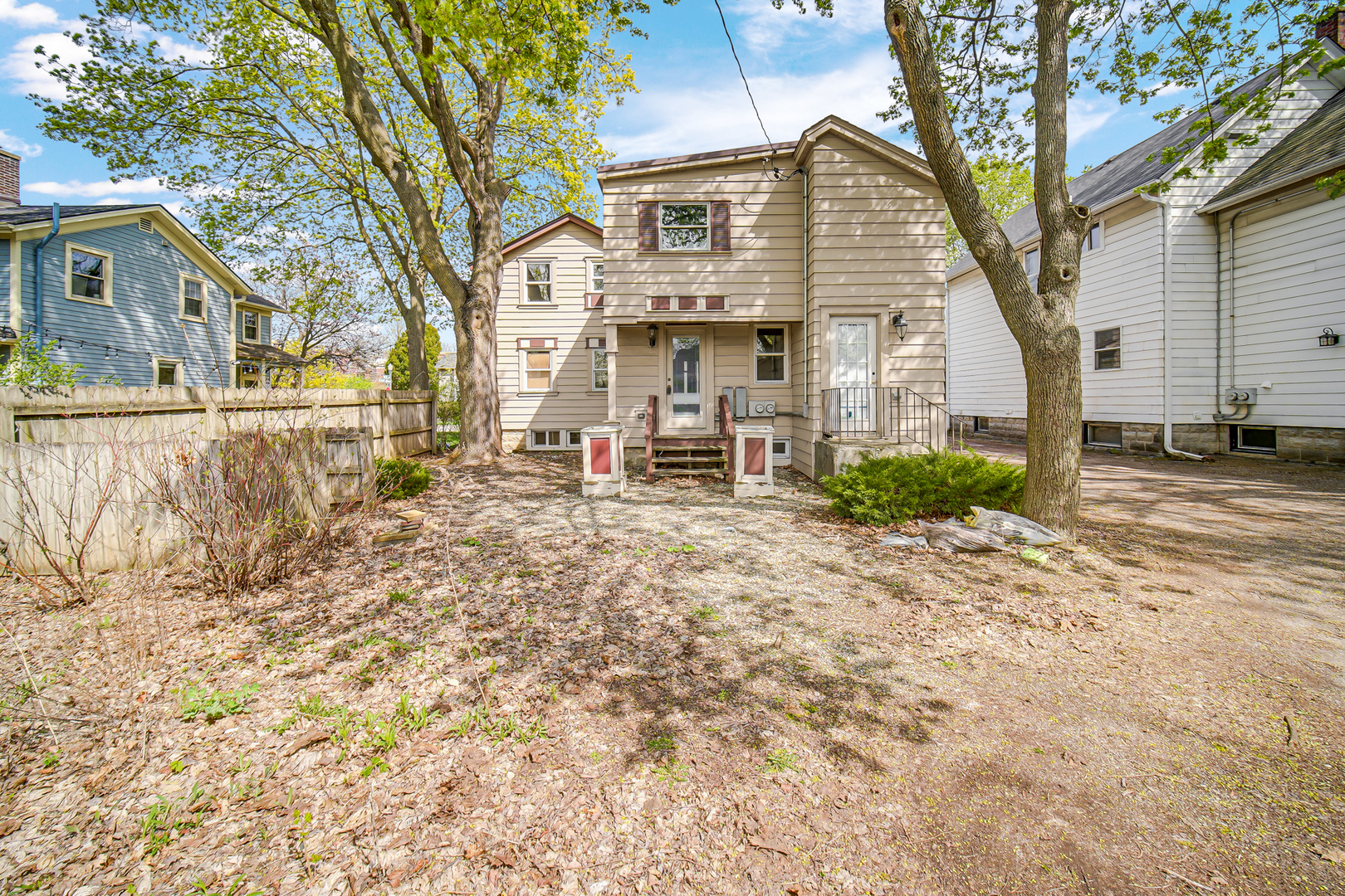 223 North Center Street Naperville, IL 60540 - Photo 17 of 19 a view of a house with a yard
