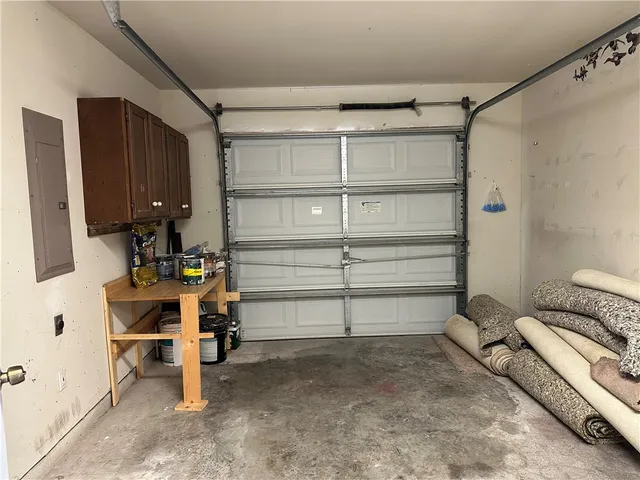 a view of room with furniture and a window