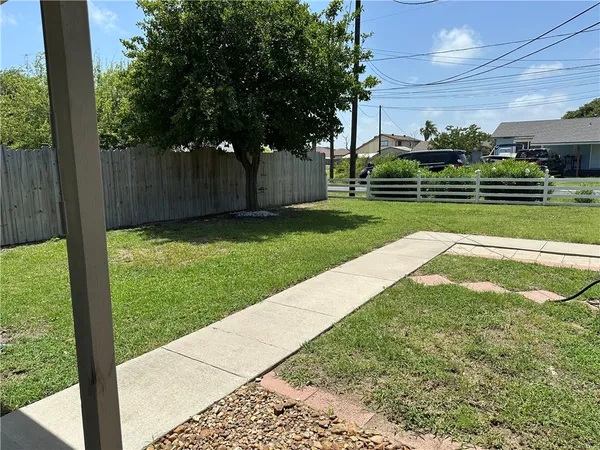 a view of backyard with green space