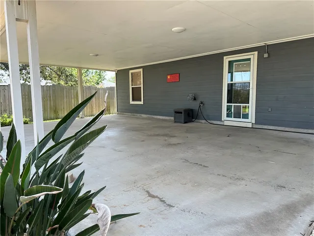 a front view of a house with a yard and porch